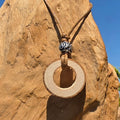 Lange Kette mit Astscheibe