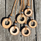 Lange Kette mit Astscheibe
