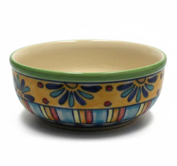 Farbenfrohe, kleine Keramikschüssel mit Blüten und Streifen